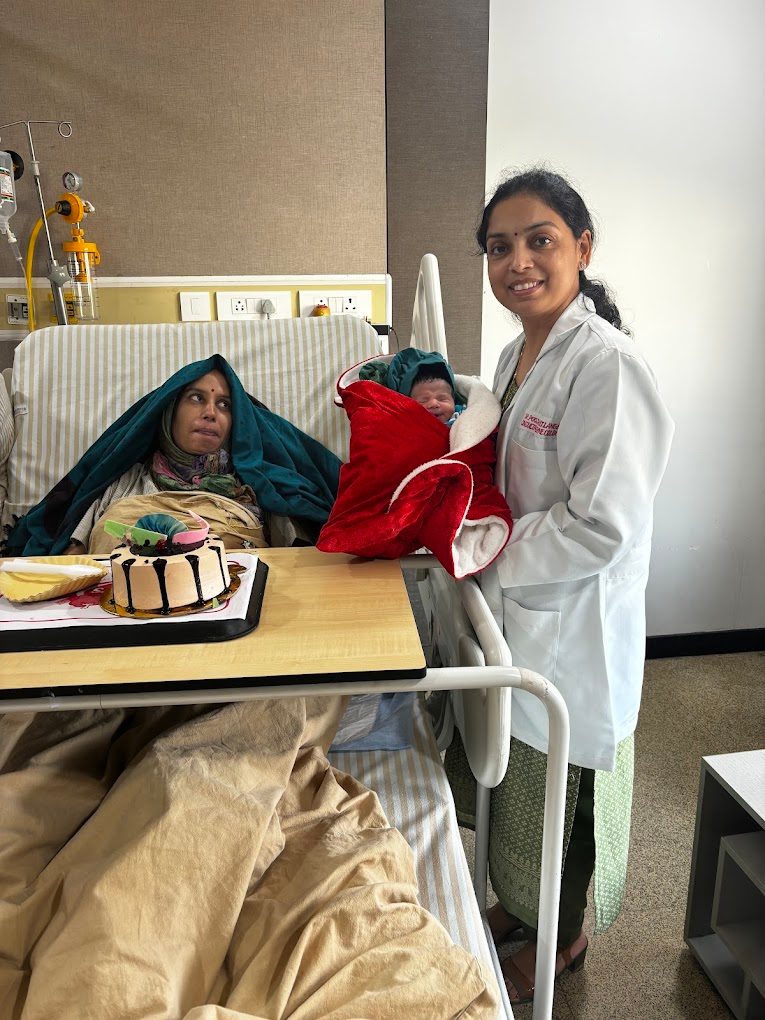 Dr. Pooja with newborn baby at Jeevan Rekha Hospital